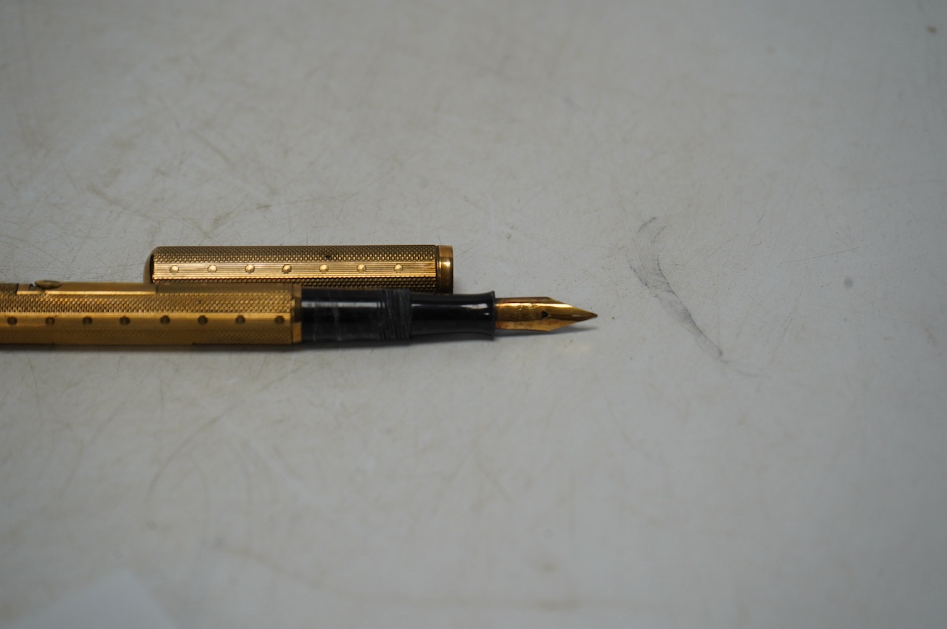 A Waterman's Ideal self-filling fountain pen with 9ct gold overlay, in original box with paperwork. Condition - good